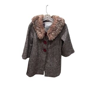 Beth Bowley woman's tweed jacket with faux fur on the collar